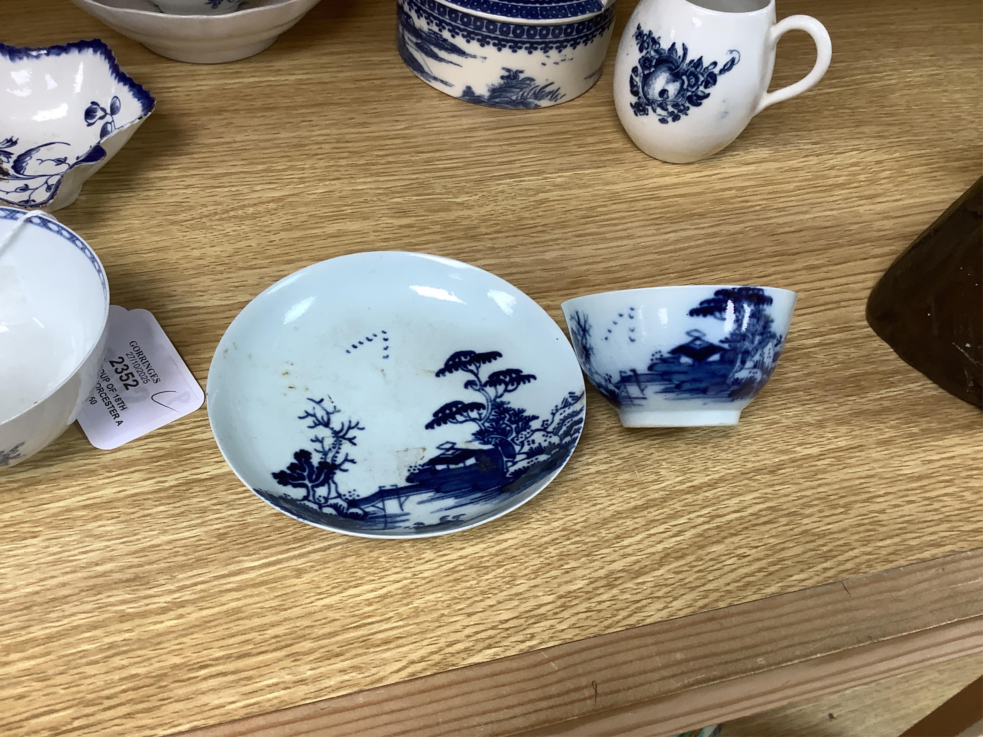A group of 18th century Worcester and Liverpool porcelain teaware and a Caughley Cormorant fisherman butter tub and cover.